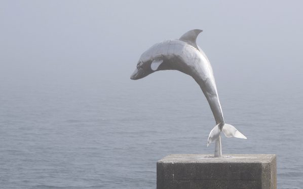 Leaping dolphin sculpture at Lochmaddy